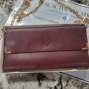 Cartier Burgundy Leather Clutch with Gold Accents